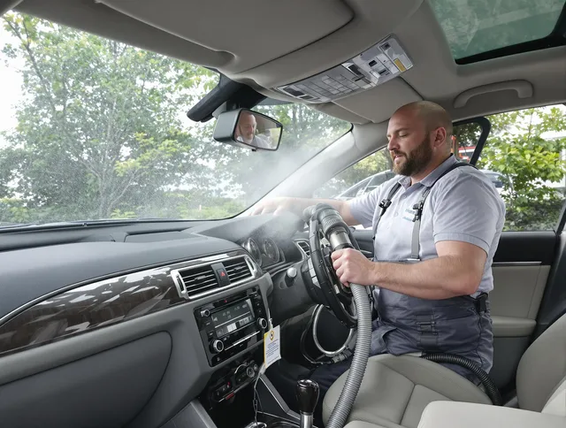 Medfield Air Duct Cleaning specialist performing professional car duct cleaning in Medfield