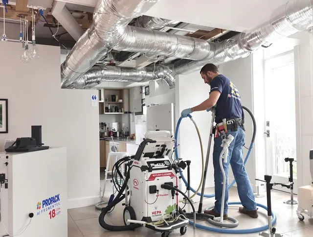 Medfield Air Duct Cleaning technician performing advanced pure duct cleaning with specialized equipment in Medfield